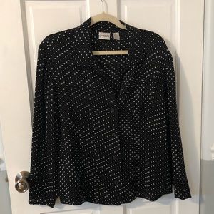 Chico’s women’s button down black blouse with white pock a dots size 2.